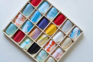 wooden box with paper circles