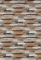 Fototapeta premium Brown tiled walls interspersed with gray tiles. with beautiful patterns