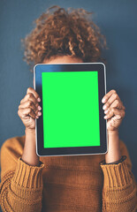 Green screen, copy space and chromakey on a tablet of a woman showing website for online advertising. Closeup of female with blank touch screen, branding for a business logo or news and marketing