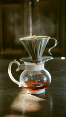   Drip coffee by using coffee beans in the cafe                             