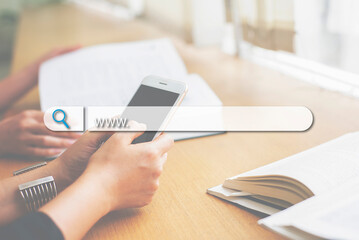 Close up on woman hands using smartphone with icon Searching for information on website