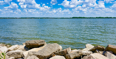 Cloudy sky, water and rocks make for a fine scenic image.