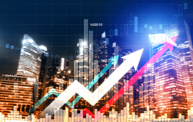 As background for a financial or business concept, digital screen and financial graphs overlap on a picture of modernistic cityscape, skyscrabbers.