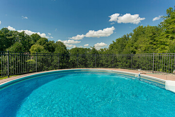 swimming pool in the park sunny blue sky