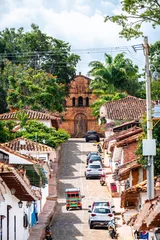 Fototapeten street view of barichara colonial town, colombia © jon_chica