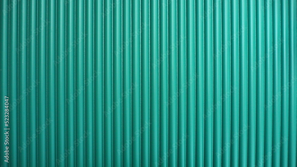 Wall mural green fluted wall in the room for decoration and background concept