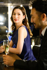 Woman being picked up at a bar counter