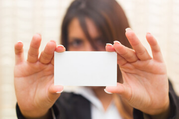 woman holding blank card