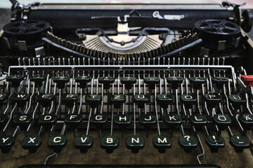 Obraz na płótnie Canvas Mechanical keyboard of an old retro typewriter.