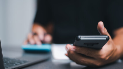 The auditor is analyzing his home documents, balance sheet management concept. form validation budget management and management of meeting reports, tax calculations