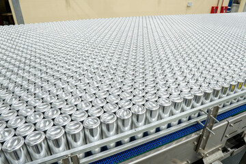 Production of aluminum cans for hot and cold drinks. High-tech equipment factory using ecological...