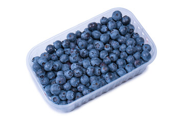 Blueberries in a plastic container isolated on white background.