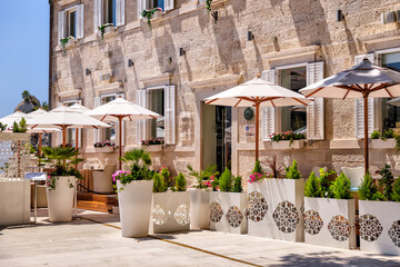 Restaurant patio in Dubrovnik, Croatia with views of the Adriatic Sea
