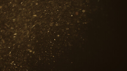 real dust particles floating over black background
