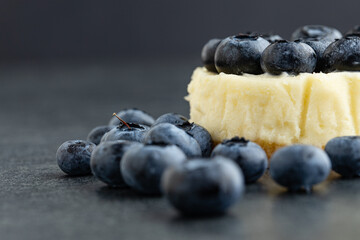 Close-up view of Blueberry cheesecake on stone background
