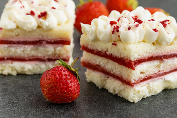 Close up view of piece of strawberry cheescake
