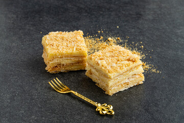 delicious Napoleon cake on stone table