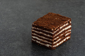 chocolate vanilla cake on gray stone