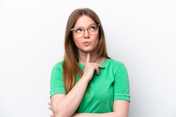 Young caucasian woman isolated on white background With glasses and looking up