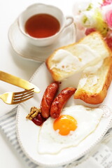 cream cheese and sausage with sunny side up egg