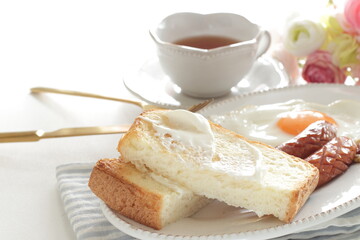 cream cheese and sausage with sunny side up egg