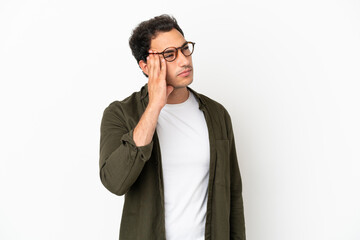 Caucasian handsome man over isolated white background with headache