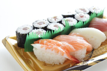 Japanese food, assorted sushi and sushi roll in lunch food container