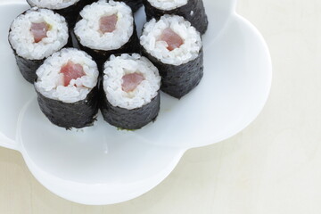 Japanese food, tuna fish roll sushi on dish 