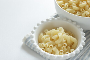 boiled macaroni in bowl for prepared cooking ingredient