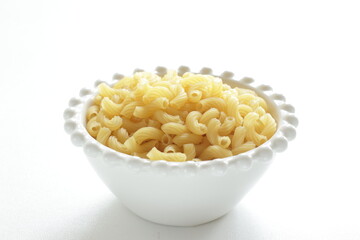 Dried Italian pasta, macaroni in bowl for dried food ingredient