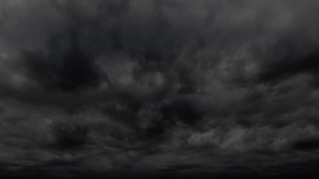 timelapse of dark dramatic sky with stormy clouds before rain or snow as abstract background, extreme weather
