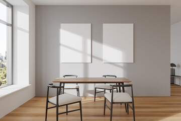 Light living room interior with seats and eating table, mockup frames