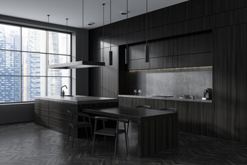 Corner view on dark kitchen room interior with island