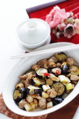 Chinese food, eggplant and chicken stir fried with leek