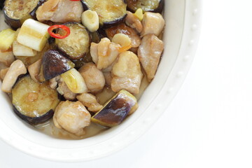 Chinese food, eggplant and chicken stir fried with leek