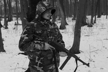 Soldier with old submachine gun in black and white