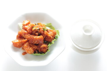 Homemade squid and sweet chili sauce on lettuce for Chinese comfort food