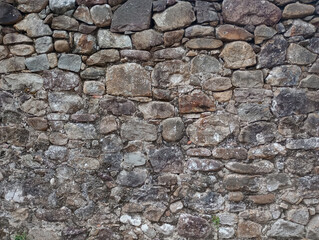 Obraz premium ancient stone wall close up pic
