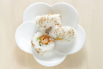 Japanese food, fried prawn sushi roll with sesame seed on top