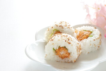 Japanese food, fried prawn sushi roll with sesame seed on top