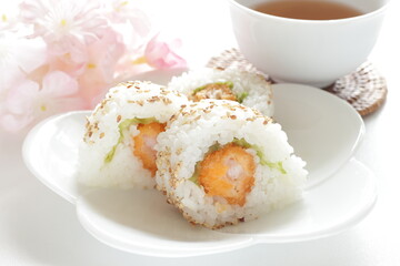 Japanese food, fried prawn sushi roll with sesame seed on top