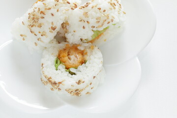 Japanese food, fried prawn sushi roll with sesame seed on top