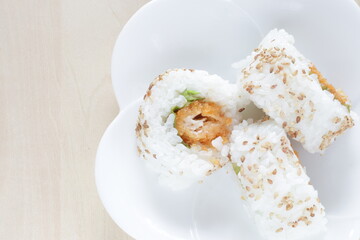 Japanese food, fried prawn sushi roll with sesame seed on top