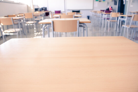 empty school classroom with chairs and desks, back to school