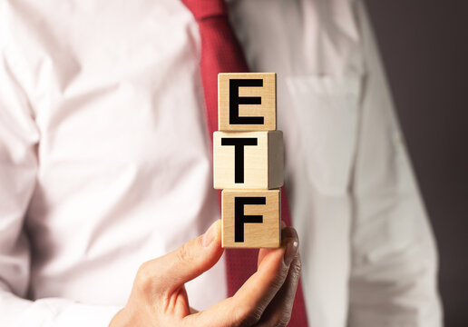 ETF investment word in investors hand
