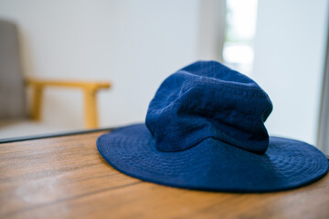 Blue hat on the coffee shop table