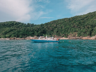 Obraz na płótnie Canvas Boats, turquoise water and white sand beach, Redang Island, Malaysia