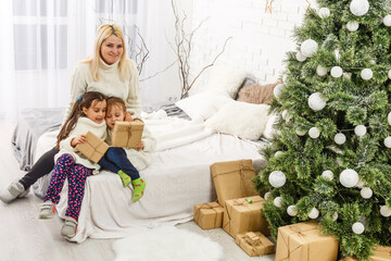 mother and children at home for christmas
