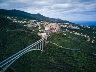 Arch bridge on the island of La Palma from drone view