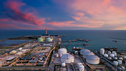 Aerial view oil terminal and coal power plant station in sea, White oil storage tank chemical...